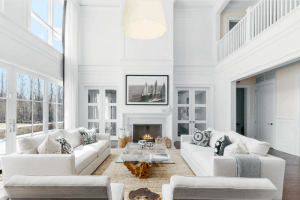 Coastal home décor featuring rattan furniture, nautical accents, and a soothing ocean-inspired colour palette with blue and white tones